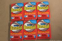 Front side of the 6 unopened wax packs showing Donruss branding and puzzle/card promotion.