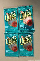 Front view of four sealed 1993 Fleer Ultra Baseball Series I foil packs.