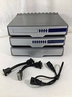 Front view of stacked CD player, preamp and amplifier with cables