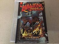 Front cover of "The Halifax Explosion" comic showing explosion scene and man in distress through segmented window.