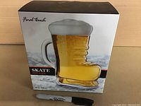 Box showing the Final Touch brand Skate Beer Glass with a skate boot design and capacity 500 ml.