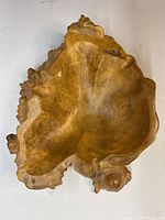 Overhead view of burled wood bowl showing overall shape and interior grain