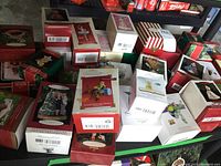 Overview of multiple Hallmark Keepsake boxes on shelf