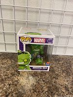 Photo of a Funko Pop vinyl figure in box depicting the Immortal Hulk character from Marvel Comics, number 840, PX Exclusive edition.