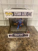 Front view of new in box Stan Lee Funko POP figure from Street Art Collection Deluxe series #63.