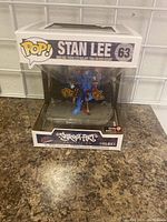 Stan Lee Funko Pop #63 boxed figure from the Street Art Collection Deluxe stickered as an exclusive.