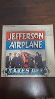 Front cover of Jefferson Airplane Takes Off LP showing the band members and title