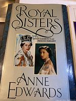 Title page of 'Royal Sisters' featuring photos of Queen Elizabeth II and Princess Margaret.
