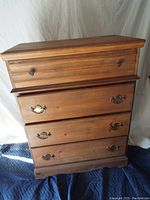 Front view of the four drawer pine dresser showing drawer types and wear