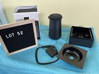 Overview showing speaker, original box, packaging tray, USB adapter and cable, inner packaging and Lot sign