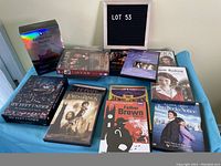Photo showing multiple DVD sets including Downton Abbey, Lovejoy, The Hobbit, Lord of the Rings, Father Brown, The Jewel in the Crown, Six Feet Under, Two Weeks Notice