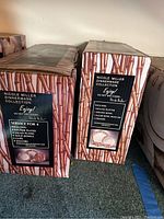 Two boxed Nicole Miller Dinnerware Collection sets in White Bamboo pattern with original packaging, listing detailed contents and care info.