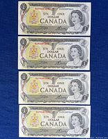Front side of four consecutive 1973 Canadian one dollar bills arranged vertically showing portrait of Queen Elizabeth II and serial numbers.