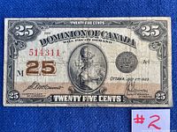 Front view of 1923 Canadian 25 cent Dominion Shinplaster bill showing detailed design, portrait of Britannia, serial number, signatures, and denomination markings.