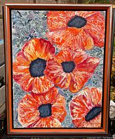 Full view of framed vintage impasto painting of orange poppies showing the floral composition and orange frame
