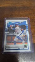 Bo Bichette rookie baseball card in protective case with Donruss branding and player in batting pose.