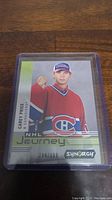 Front of the Carey Price NHL Synergy Journey short print hockey card numbered 294/999 in protective sleeve.
