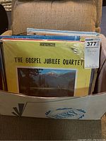 Box of mostly bluegrass LP records showing The Gospel Jubilee Quartet album with a yellow cover.