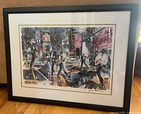 Full view of framed print showing artwork, custom black frame and double white mat with gold trim