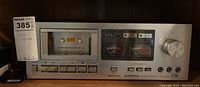 Full front view of Pioneer tape deck showing cassette door, transport buttons, and VU meters