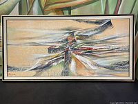 Full view of framed abstract painting showing overall composition and frame.