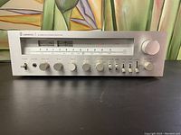 Front view of SHERWOOD S-7650 CP stereo receiver showing all control knobs, tuning dial and power switch.