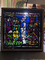 Front view of stained glass panel showing full scene and frame