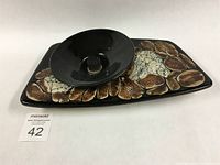 View of the pottery Ikebana flower vase set arranged on white background, showing glossy bowl on decorative base with crackled glaze.