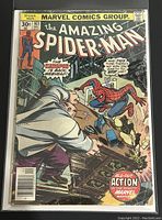 Front cover of The Amazing Spider-Man #163 comic book showing spider-man, Kingpin, and text 'The Kingpin is back, webhead!' and 'All-out action in the mighty Marvel manner'.