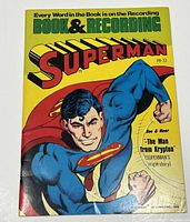Front cover of the comic book showing Superman and title details