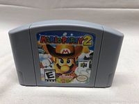 Front of Nintendo 64 cartridge showing Mario Party 2 label with Mario in cowboy hat.