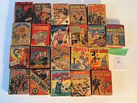 Top view of all 21 Better Little Books displaying the colorful cover art of various children and comic book characters.