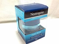 Front and side views of the Neutrogena Hydro Boost Night Pressed Serum in its original sealed box showing product details and branding.