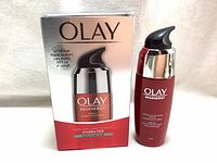 Photo of Olay Regenerist Micro-Sculpting Serum bottle with original boxed packaging.