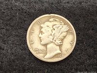 Obverse of 1938 Mercury Head Dime showing Liberty's winged cap and inscriptions