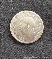 Obverse side of the 1942 Canadian dime featuring a portrait of King George VI with the inscription around the edge.