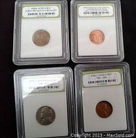 Four graded USA coins in clear protective holders. Top left coin is 2005-D Jefferson Nickel Ocean Brilliant Uncirculated, top right is 2009-D Lincoln 100 Cash Commemorative Issue Brilliant Uncirculated, bottom left is Early Jefferson Nickel 1938-1976, bottom right is Early Lincoln Cent 1909-1938.