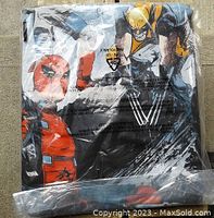 Marvel vintage-style t-shirt with Deadpool and Wolverine on the front, sealed in original plastic packaging.