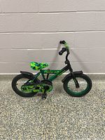 Full side view of the kids bike showing frame, wheels, and seat.