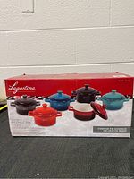 Box of Lagostina Set of 6 Mini Stoneware Casserole Dishes showing all colors and product branding