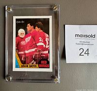 Front side of the 1987-88 OPC Adam Oates rookie card in screwdown holder.