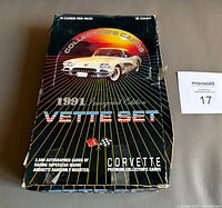 Front and top view of 1991 Corvette Collector's Cards premium wax box with visible wear and tape on the edges.