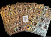 10 custom binder pages displayed with 18 Wayne Gretzky POGs each, showing colorful front illustrations and Coca-Cola branding.