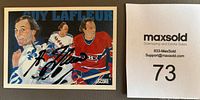 Photo of the autographed 1991-92 Score hockey card featuring Guy Lafleur with bold black Sharpie signature on front.