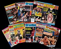 Twelve individual Sports Review Wrestling magazines from 1987 displayed fanned out, showing various cover images of wrestlers such as Hulk Hogan, Randy Savage and others.