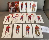 Full spread of approximately two dozen Montreal Canadiens 1986-87 player postcards arranged in rows