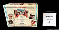Factory sealed 1991-92 Upper Deck Hockey High Series box showing front and side views with branded wrap and player card images.