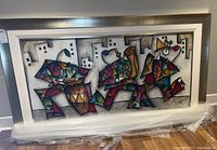 Full frontal view of framed abstract canvas painting