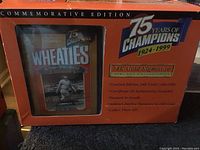 Boxed Wheaties Babe Ruth collectible with 24k gold signature and certificate of authenticity, never opened.