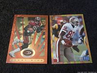 Front side of two Jerry Rice football cards showing player in San Francisco 49ers uniforms